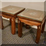 F57. Pair of Asian-inspired end tables. 